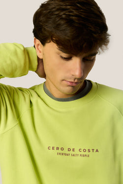 SUDADERA VERDE/MALVA "CERO DE COSTA" PLAYAS SURF