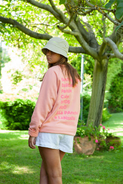 SUDADERA ROSA SALMÓN/FUCSIA “CERO DE COSTA” PLAYAS SURF